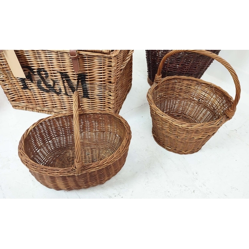 320 - BASKETS, a set of seven, wicker in various sizes, to include a picnic hamper, 40cm H x 60cm x 40cm D... 