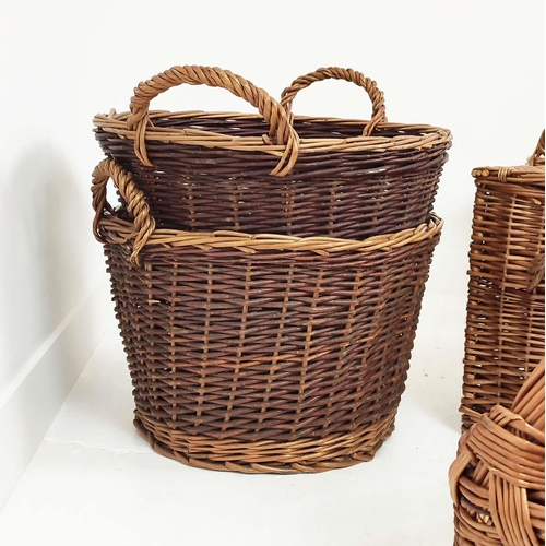 320 - BASKETS, a set of seven, wicker in various sizes, to include a picnic hamper, 40cm H x 60cm x 40cm D... 