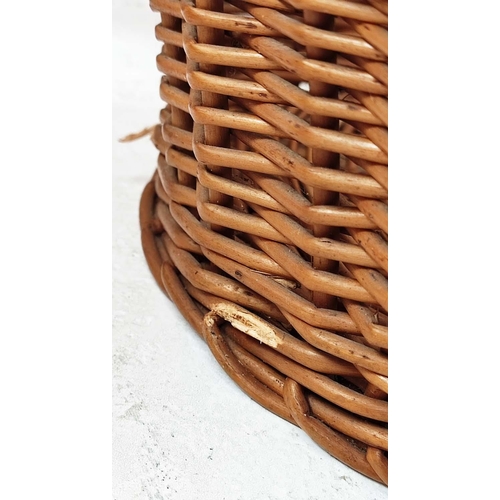 320 - BASKETS, a set of seven, wicker in various sizes, to include a picnic hamper, 40cm H x 60cm x 40cm D... 