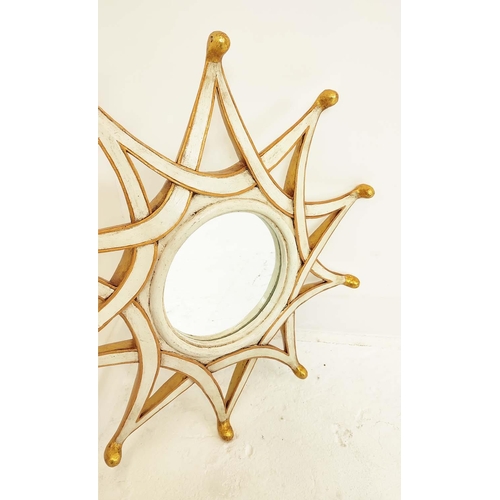 321 - ATTRIBUTED TO THEODORE ALEXANDER STELLAR REFLECTION STARBURST MIRROR, white and gilt painted, 70cm W... 