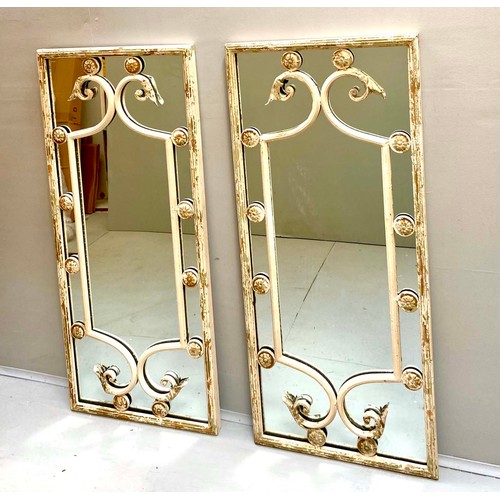 351 - ARCHITECTURAL WALL MIRRORS, a pair, Italian style with distressed metal frames, 112cm H x 48cm W (2)