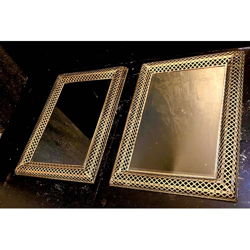 354 - ARCHITECTURAL WALL MIRRORS, a pair, rectangular with pierced gilt metal frames, 100cm H x 70cm. (2)