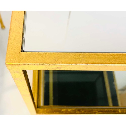 363 - SIDE TABLES, a pair, gilt metal frames with three glass shelves, 56cm H x 51cm x 51cm. (2)