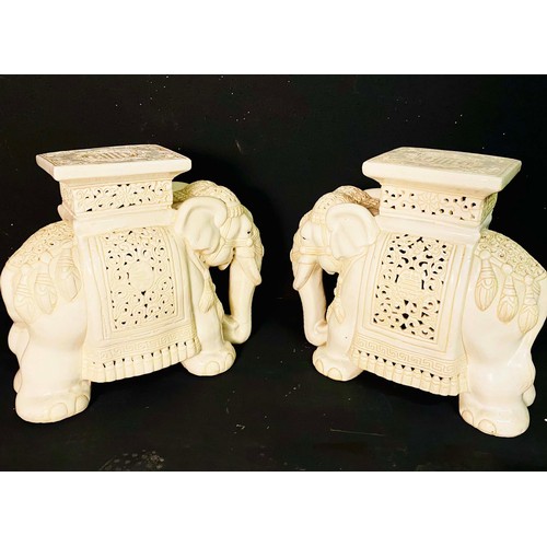 370 - GARDEN STOOLS, a pair, white ceramic Indian elephants, 44cm H x 49cm L x 22cm W (2)