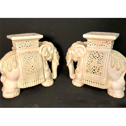 370 - GARDEN STOOLS, a pair, white ceramic Indian elephants, 44cm H x 49cm L x 22cm W (2)