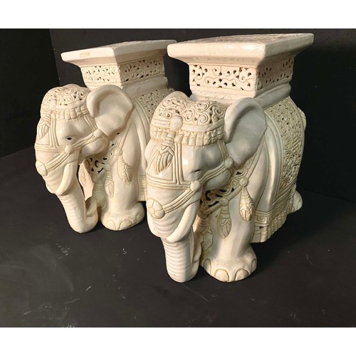 370 - GARDEN STOOLS, a pair, white ceramic Indian elephants, 44cm H x 49cm L x 22cm W (2)