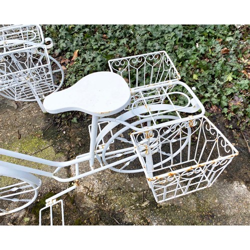 373 - BICYCLE PLANTERS, a set of four, white painted metal, 63cm H x 88cm x 44cm. (4)