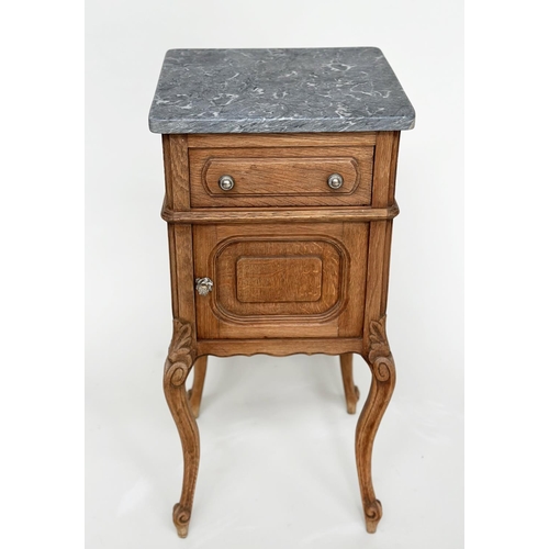 221 - BEDSIDE CABINETS, a pair, 19th century French oak, each with drawer, and panelled door with grey mar... 