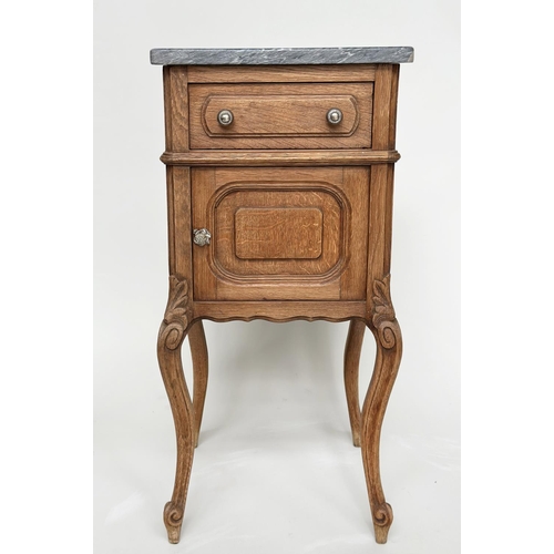 221 - BEDSIDE CABINETS, a pair, 19th century French oak, each with drawer, and panelled door with grey mar... 