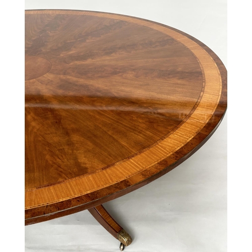 228 - DINING TABLE, circular Regency style radially veneered mahogany and satinwood crossbanded with outsw... 