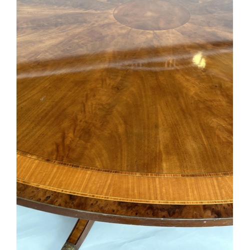 228 - DINING TABLE, circular Regency style radially veneered mahogany and satinwood crossbanded with outsw... 