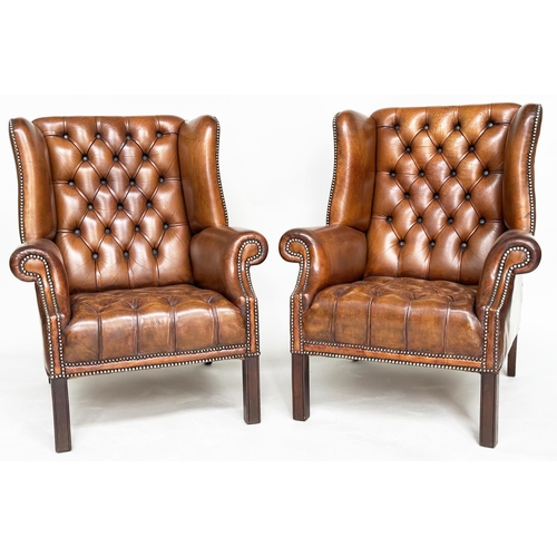 222 - WINGBACK ARMCHAIRS, a pair, George III design natural antique tan brown brass studded leather uphols... 