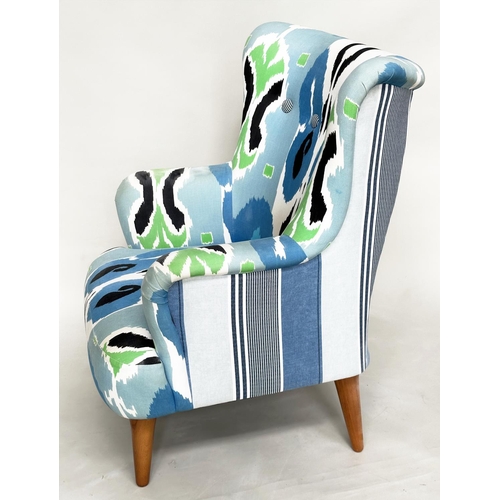 309 - ARMCHAIR, contemporary batik style upholstery with buttoned back and tapering supports, 80cm W.