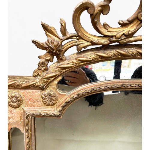 224 - WALL MIRROR, 19th century French giltwood and gesso moulded, arched with marginal mirror plates and ... 