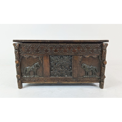 267 - COFFER, antique Jacobean design oak, ash and metal mounted with a rising lid, carved detail and appl... 