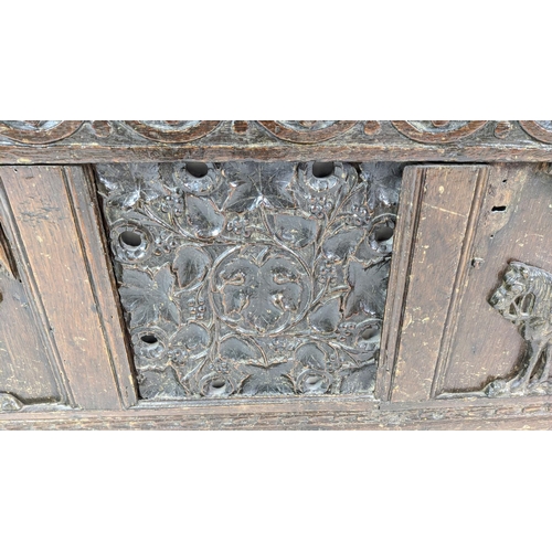 267 - COFFER, antique Jacobean design oak, ash and metal mounted with a rising lid, carved detail and appl... 