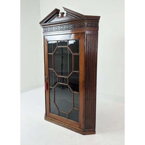 271 - GLAZED CORNER CABINET, George III mahogany with carved blind fretwork detail with fluted detail and ... 