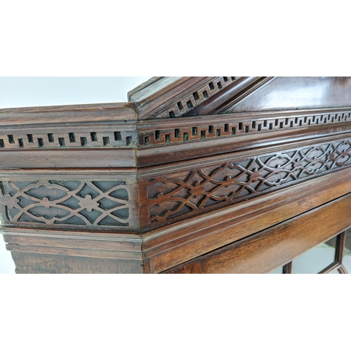 271 - GLAZED CORNER CABINET, George III mahogany with carved blind fretwork detail with fluted detail and ... 