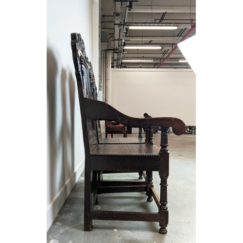 261 - WAINSCOT ARMCHAIRS, a pair, late 19th century Carolean style oak with carved backs, 119cm H x 61cm x... 