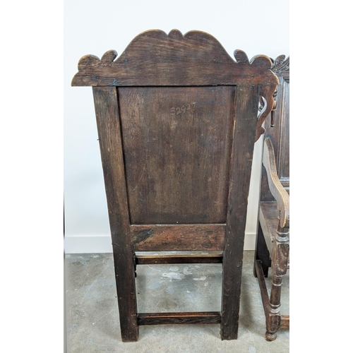 261 - WAINSCOT ARMCHAIRS, a pair, late 19th century Carolean style oak with carved backs, 119cm H x 61cm x... 