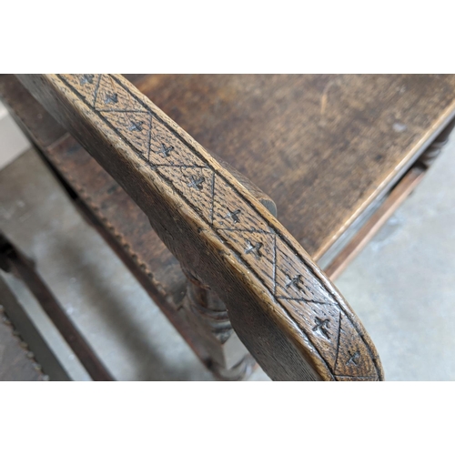 261 - WAINSCOT ARMCHAIRS, a pair, late 19th century Carolean style oak with carved backs, 119cm H x 61cm x... 