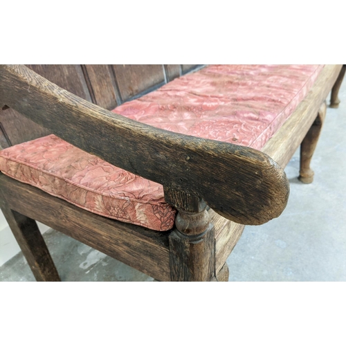 262 - SETTLE, George III oak with rope seat and floral squab cushion, 100cm H x 167cm x 67cm.