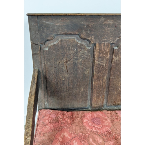 262 - SETTLE, George III oak with rope seat and floral squab cushion, 100cm H x 167cm x 67cm.