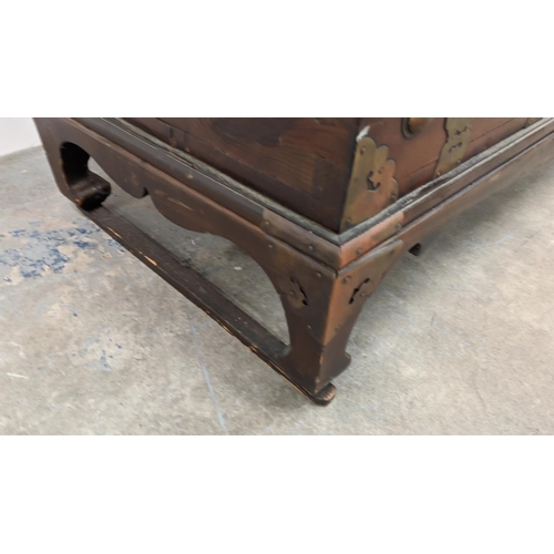 238 - CHEST, 19th century Korean firwood and brass mounted with fall front enclosing four drawers, 99cm H ... 