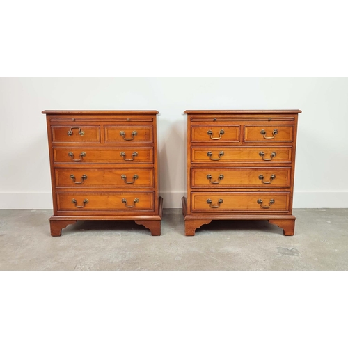 239 - BEDSIDE CHESTS, a pair, Georgian style yewwood, each with green leather slide above five drawers, 67... 