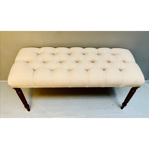 346 - WINDOW SEAT, with neutral buttoned upholstery on reeded wooden supports 98cm L x 47cm H x 41cm W