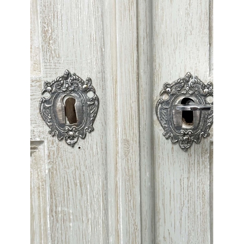 202 - ARMOIRE, French style grey painted with two panelled doors enclosing hanging space above four drawer... 