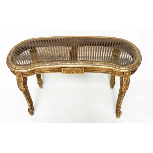 203 - WINDOW SEAT, late 19th century French Louis XVI style giltwood with cane seat and carved tapering su... 