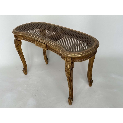 203 - WINDOW SEAT, late 19th century French Louis XVI style giltwood with cane seat and carved tapering su... 