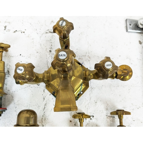 235 - TAPS, brass, French Art Deco design, one pair of basin taps, one mixer tap and a mixer/shower bath t... 