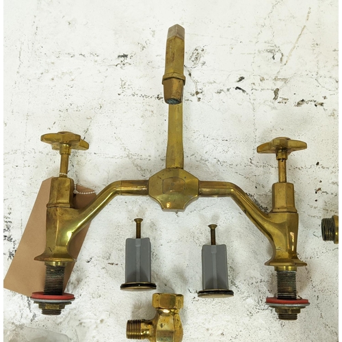 235 - TAPS, brass, French Art Deco design, one pair of basin taps, one mixer tap and a mixer/shower bath t... 