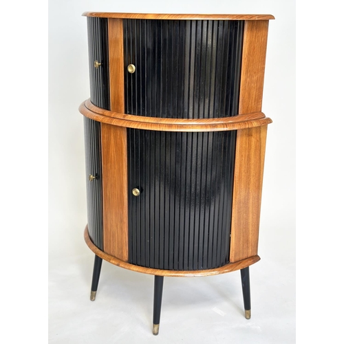 194 - COCKTAIL CABINET, 1960's demi lune walnut with double tambour sliding doors, shelved and glazed inte... 