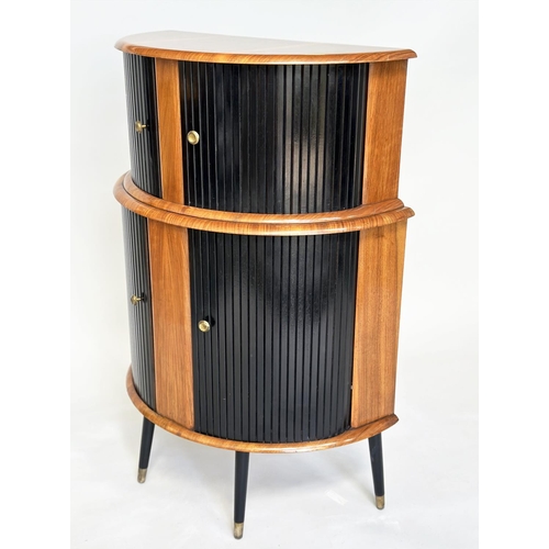 194 - COCKTAIL CABINET, 1960's demi lune walnut with double tambour sliding doors, shelved and glazed inte... 