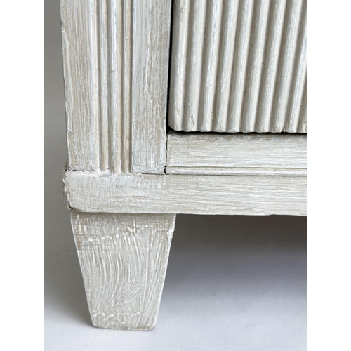 200 - GUSTAVIAN STYLE COMMODE, 19th century Continental grey painted with four drawers and tapering suppor... 