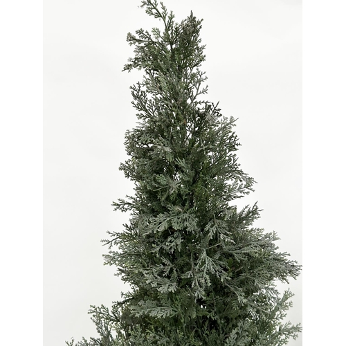 216 - ARTIFICIAL CONIFERS, a pair, in silvered metal drum planters, planters 49cm W, heights overall appro... 