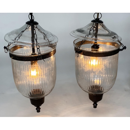193 - BELL JAR HALL LANTERNS, a pair, glass reeded tapering and bronze style mounted, 58cm H x 34cm. (2)