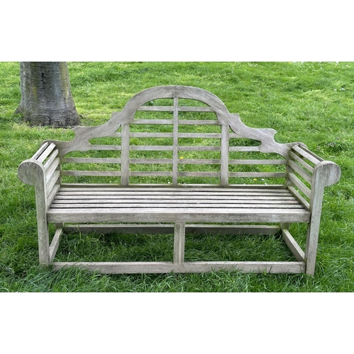 218 - LUTYENS STYLE GARDEN BENCH, weathered teak slatted after a design by Sir Edwin Lutyens, 160cm W.