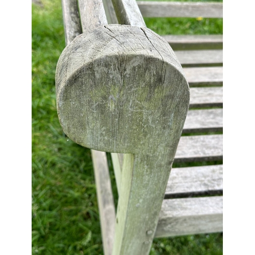 218 - LUTYENS STYLE GARDEN BENCH, weathered teak slatted after a design by Sir Edwin Lutyens, 160cm W.