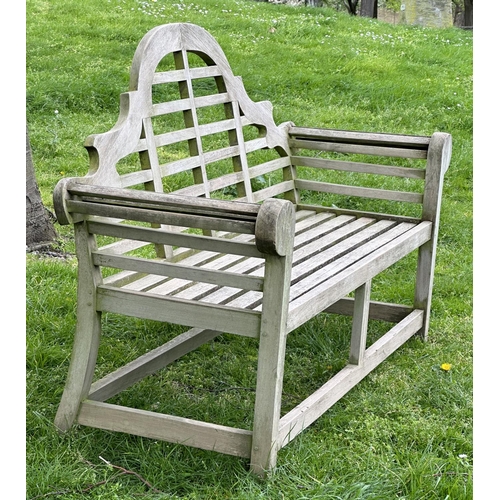 218 - LUTYENS STYLE GARDEN BENCH, weathered teak slatted after a design by Sir Edwin Lutyens, 160cm W.
