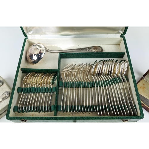 23 - A CANTEEN OF CUTLERY, silver plated, comprising twelve place settings, green case plus carving set. ... 