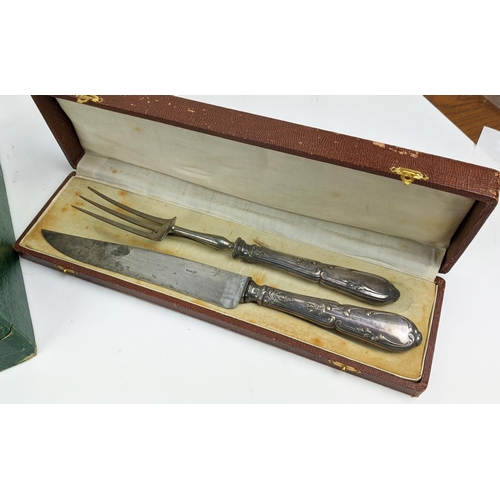 23 - A CANTEEN OF CUTLERY, silver plated, comprising twelve place settings, green case plus carving set. ... 