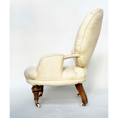 191 - SLIPPER ARMCHAIR, 19th century button upholstered, yellow fabric with turned front supports, 46cm W.