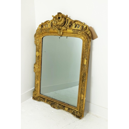 178 - WALL MIRROR, mid 19th century French giltwood and gesso frame with shell crest, 118cm H x 79cm W.