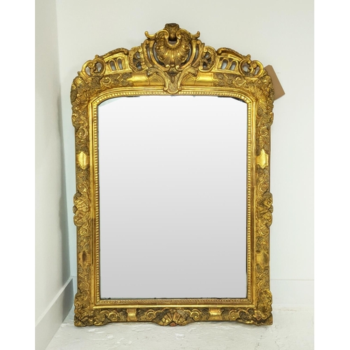 178 - WALL MIRROR, mid 19th century French giltwood and gesso frame with shell crest, 118cm H x 79cm W.