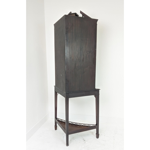 168 - GLAZED CORNER CABINET ON STAND, Edwardian mahogany in Chippendale style with door and carved fretwor... 