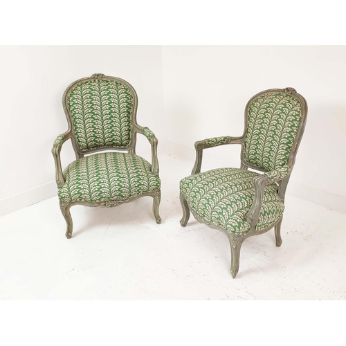 155 - FAUTEUILS, a pair, Louis XV style, grey painted with green leaf patterned upholstery, 92cm H x 54cm ... 